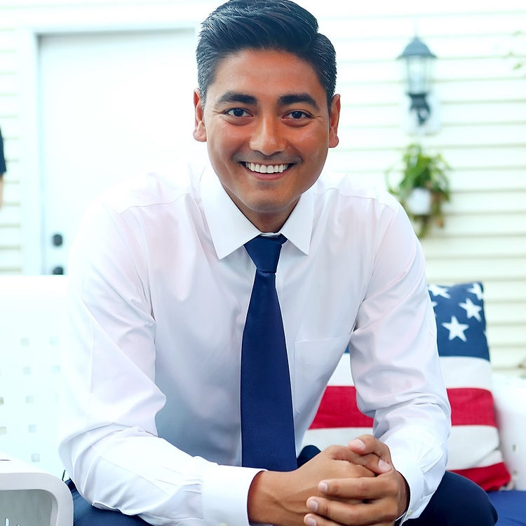 Aftab Pureval is the 70th Mayor of Cincinnati. He was raised in Southwest, Ohio, the

son of first-generation Americans. He is making history as Cincinnati’s first Asian-
American Mayor. He has made equitable economic growth a top priority of his

administration, as well as a comprehensive reform and improvement of public
safety, affordable housing, and environmental action.
Since taking office, Mayor Aftab has guided Cincinnati through a significant economic
recovery, while advancing the City’s key strategic priorities for equitable growth.
Early accomplishments include establishing the City’s first-ever annual commitment
to an affordable housing trust fund, leading on a comprehensive zoning reform to
bring more housing options to neighborhoods, and implementing a new policy to
send unarmed mental health professionals to some nonviolent 911 calls. Under his
leadership, the City’s budget was balanced after multiple years of structural deficits,
and the City committed for the first time to carbon neutrality by 2050.
Mayor Aftab graduated from The Ohio State University and the University of
Cincinnati College of Law, where he represented victims of domestic violence who
could not afford an attorney. He resides near the University of Cincinnati with his
wife, Whitney, and their sons, Bodhi and Rami.
